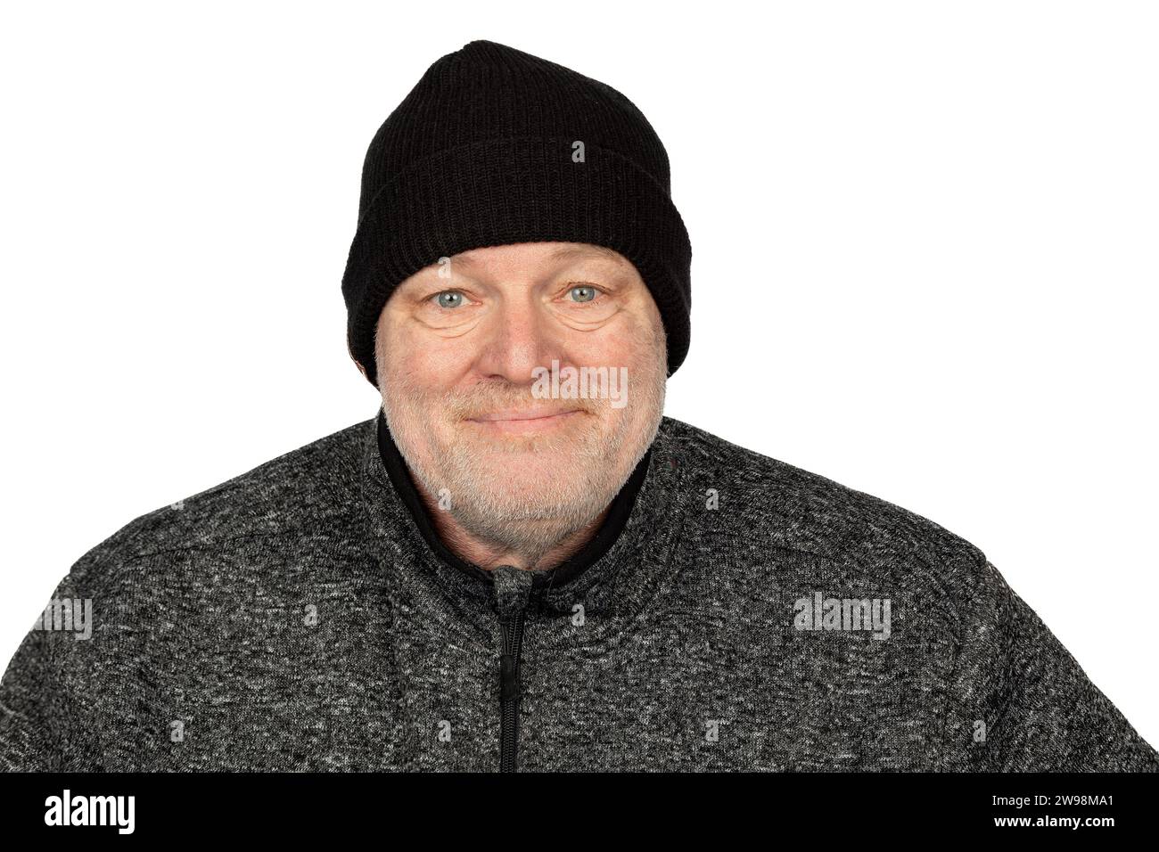 Cheerful Middle-Aged Caucasian Worker in Black Winter Hat on White Background Stock Photo