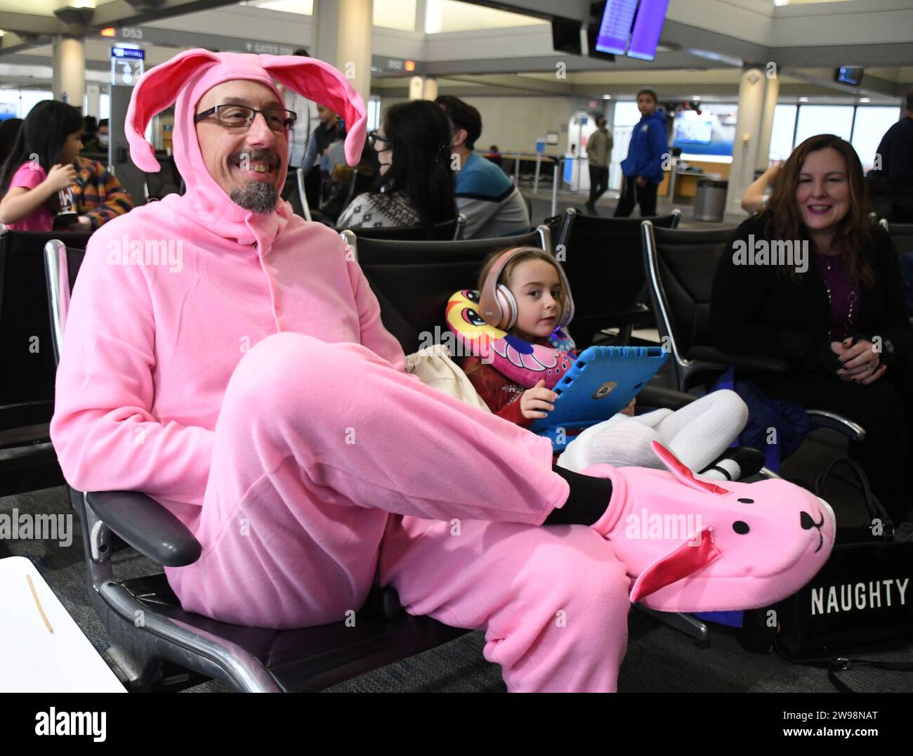Milwaukee, Wisconsin, USA. 25th Dec, 2023. NICHOLAS GRASSEL is dressed as Ralphie in his bunny