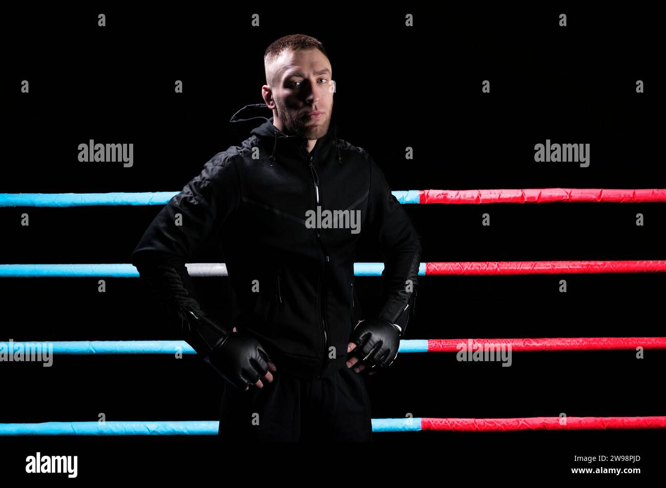 Mixed martial artist posing in boxing ring. Concept of mma, ufc, thai