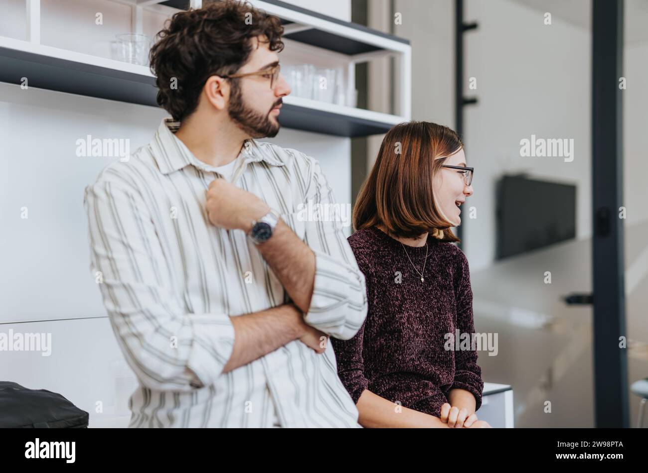Business people collaborating on analyzing project and discussing statistics. Stock Photo