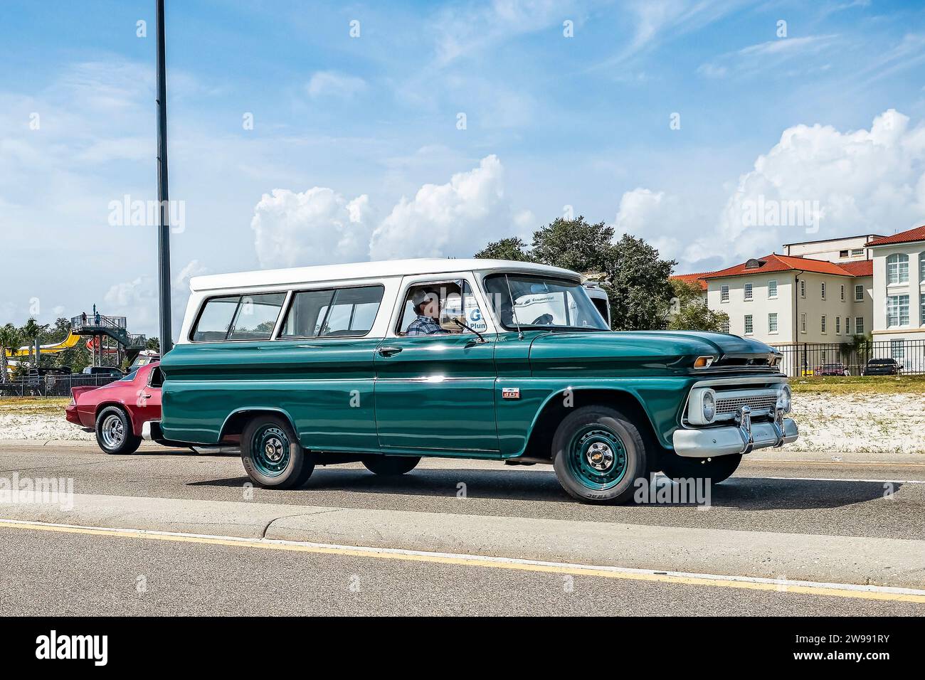Gulfport, MS - October 05, 2023: Wide angle side view of a 1964 Chevrolet C10 Suburban Carryall at a local car show. Stock Photo