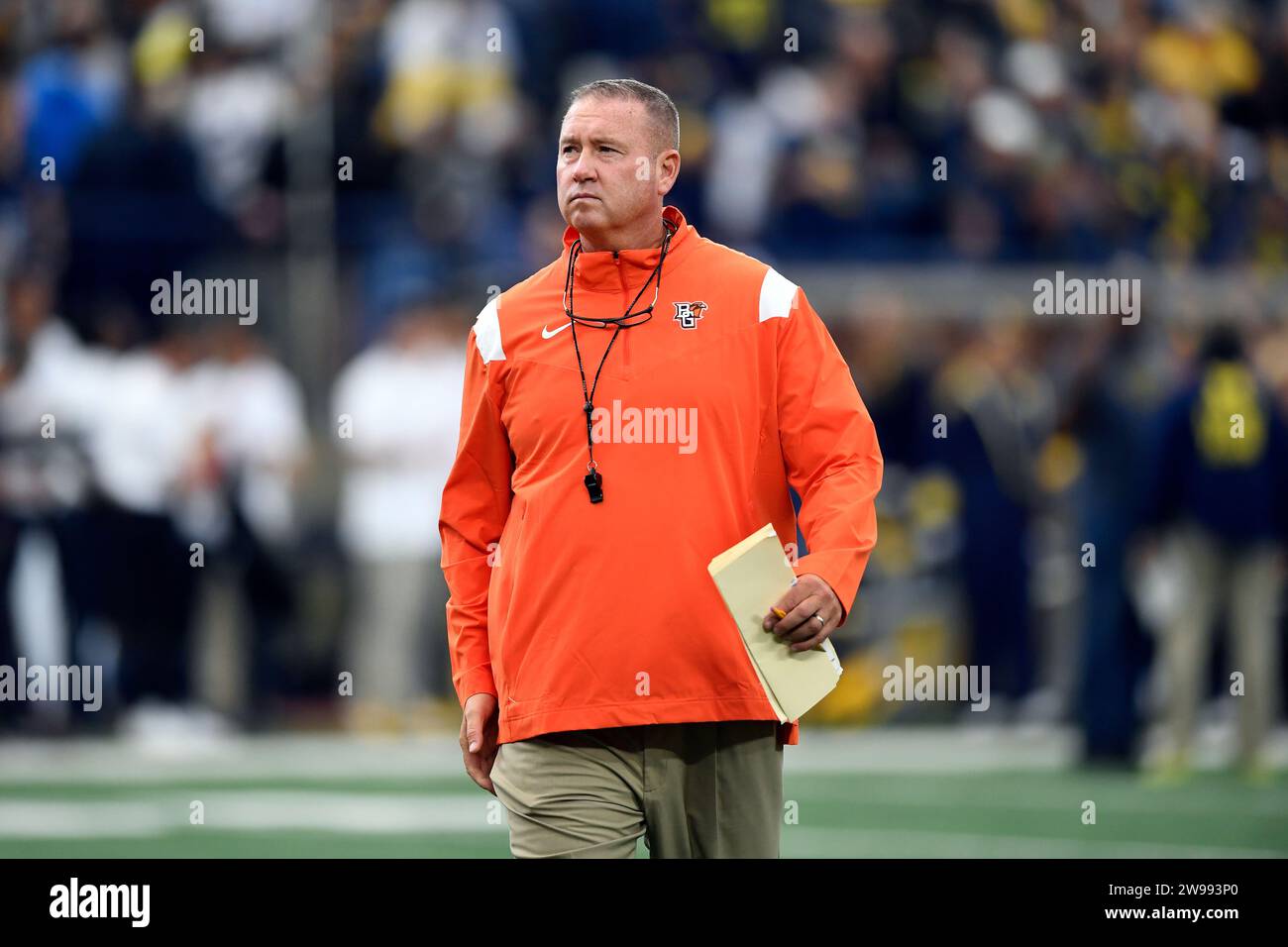 FILE - Bowling Green head coach Scot Loeffler walks on the field before ...