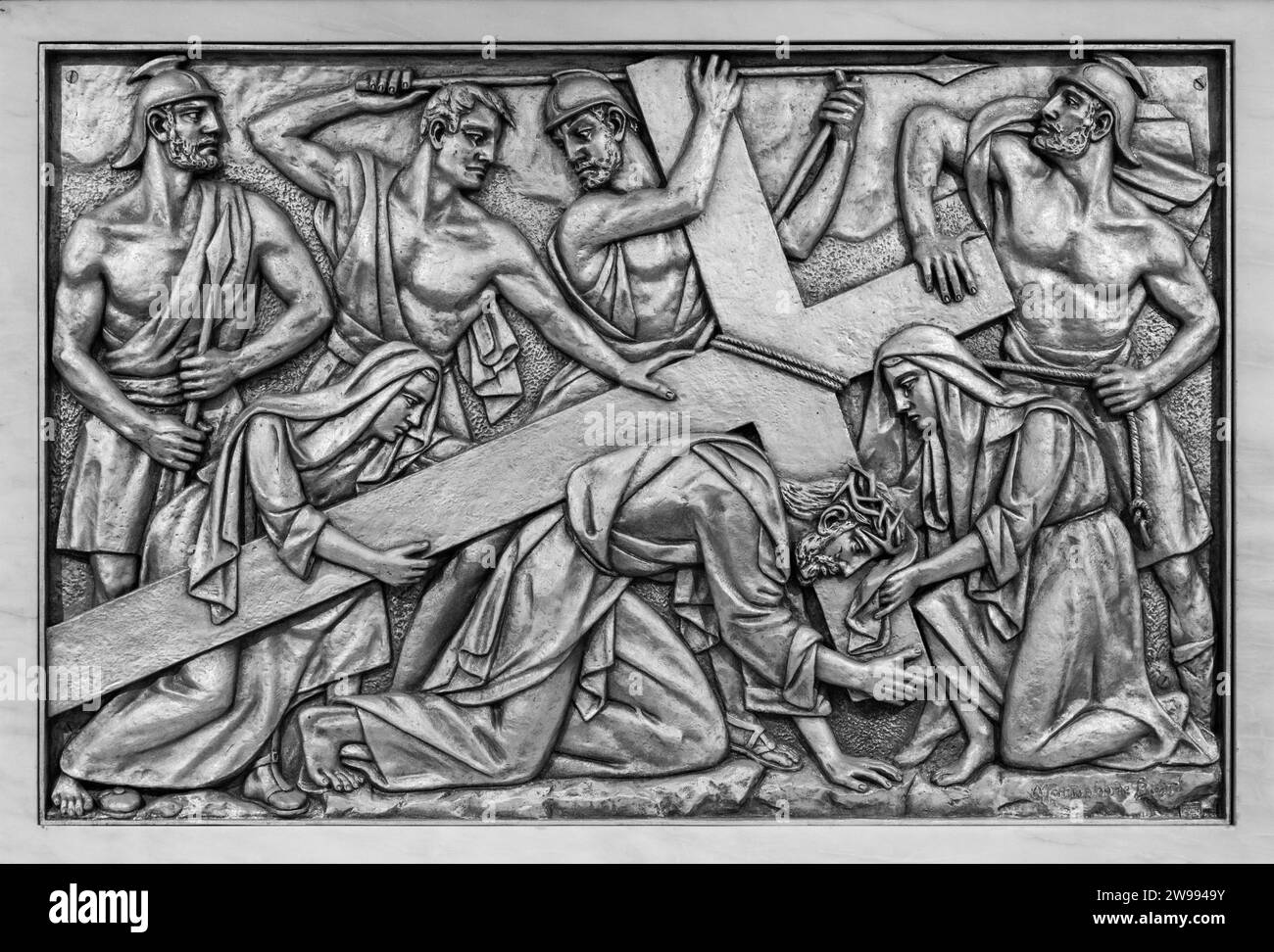 The Carrying of the Cross – Fourth Sorrowful Mystery. A relief sculpture in the Basilica of Our Lady of the Rosary of Fatima. Stock Photo