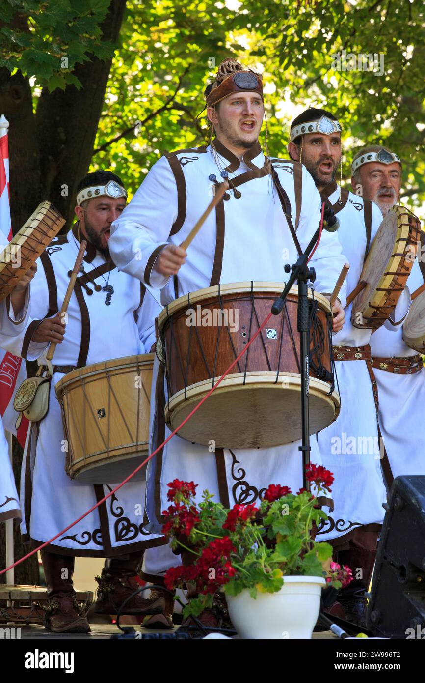 A Hungarian folk ensemble throat singing at a folk festival in the City Park of Budapest, Hungary Stock Photo