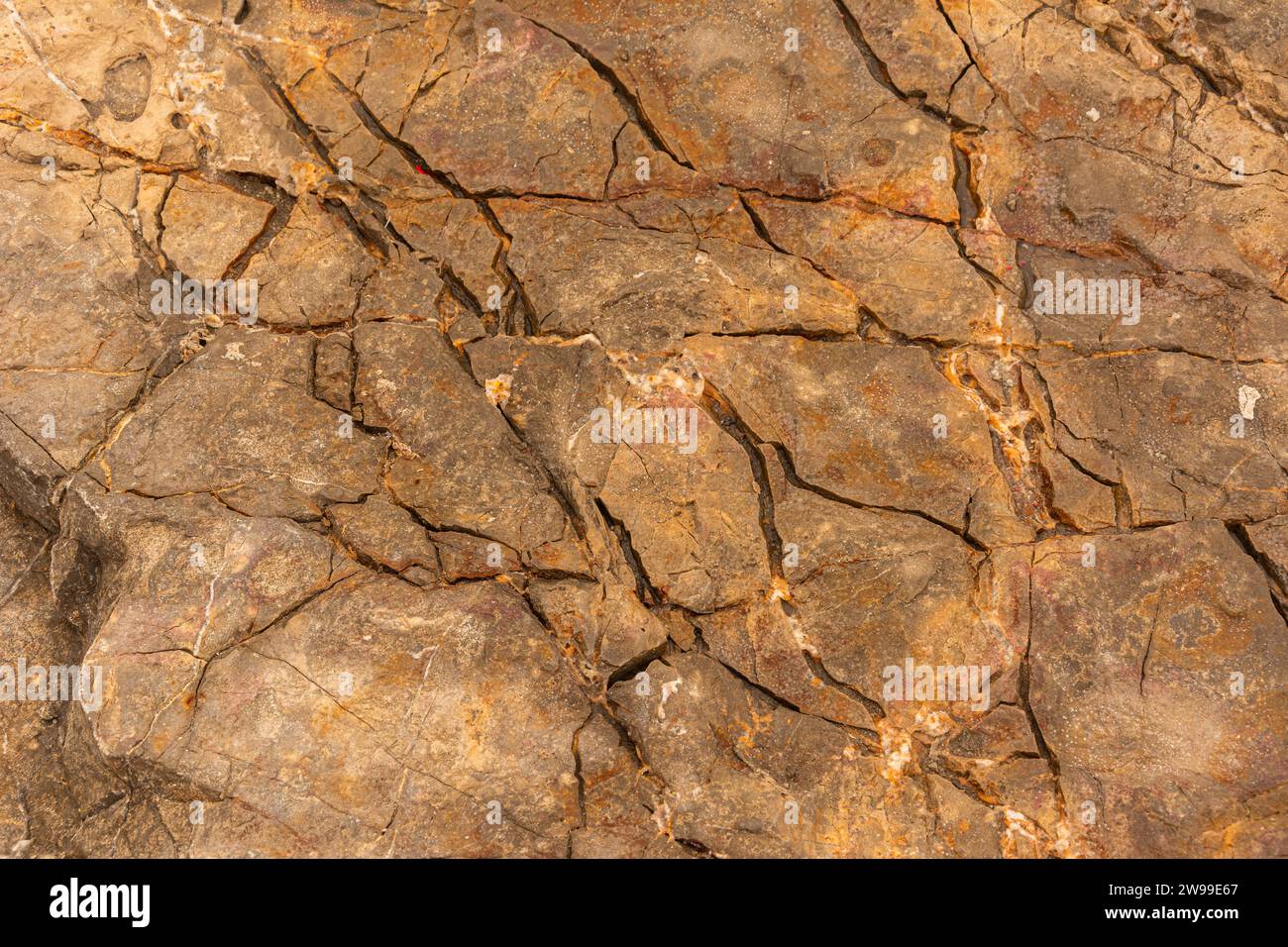 Textured rock surface produced by water and wind erosion Stock Photo