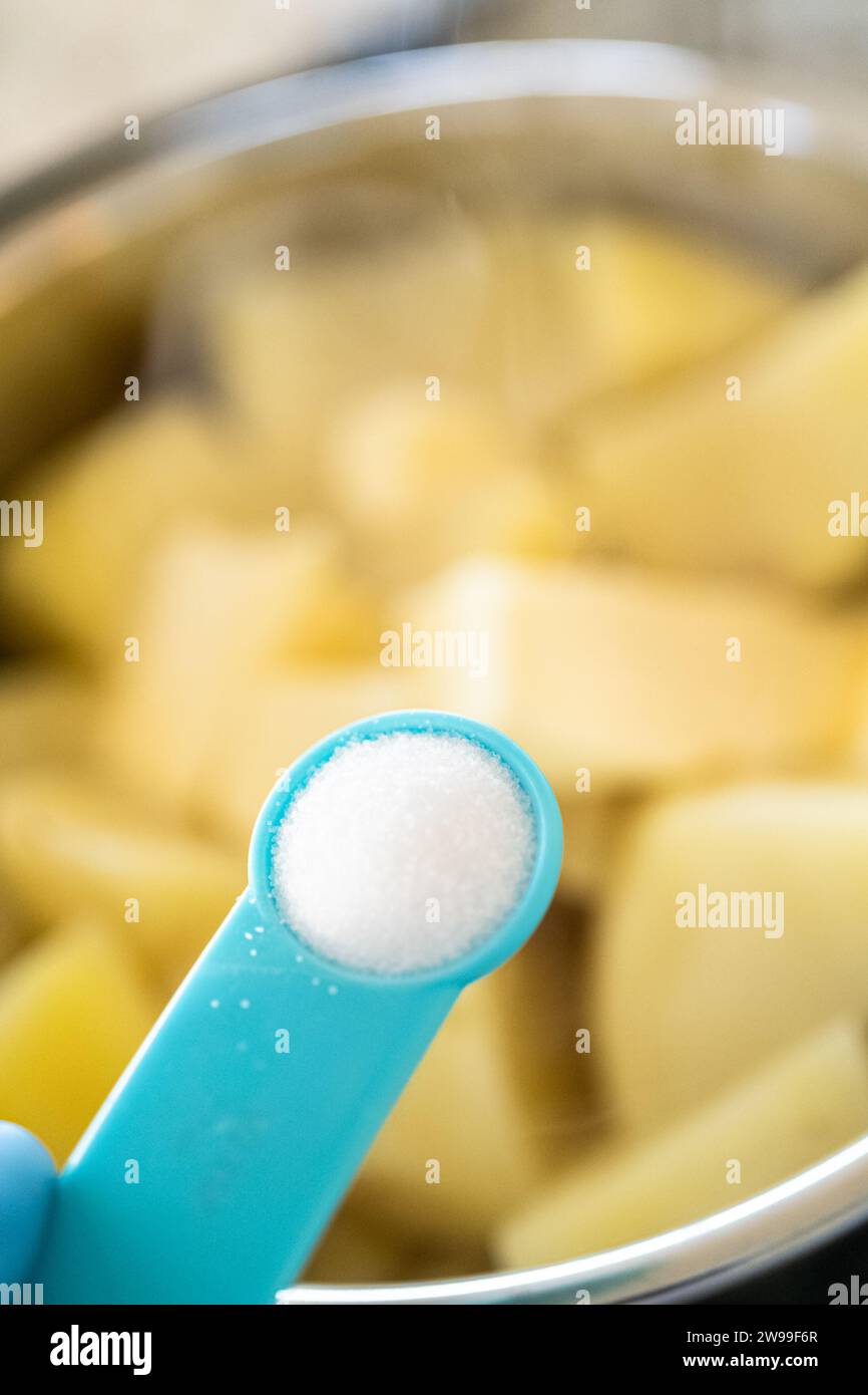 Whipping Up Creamy Mashed Potatoes in Modern Kitchen Stock Photo Alamy