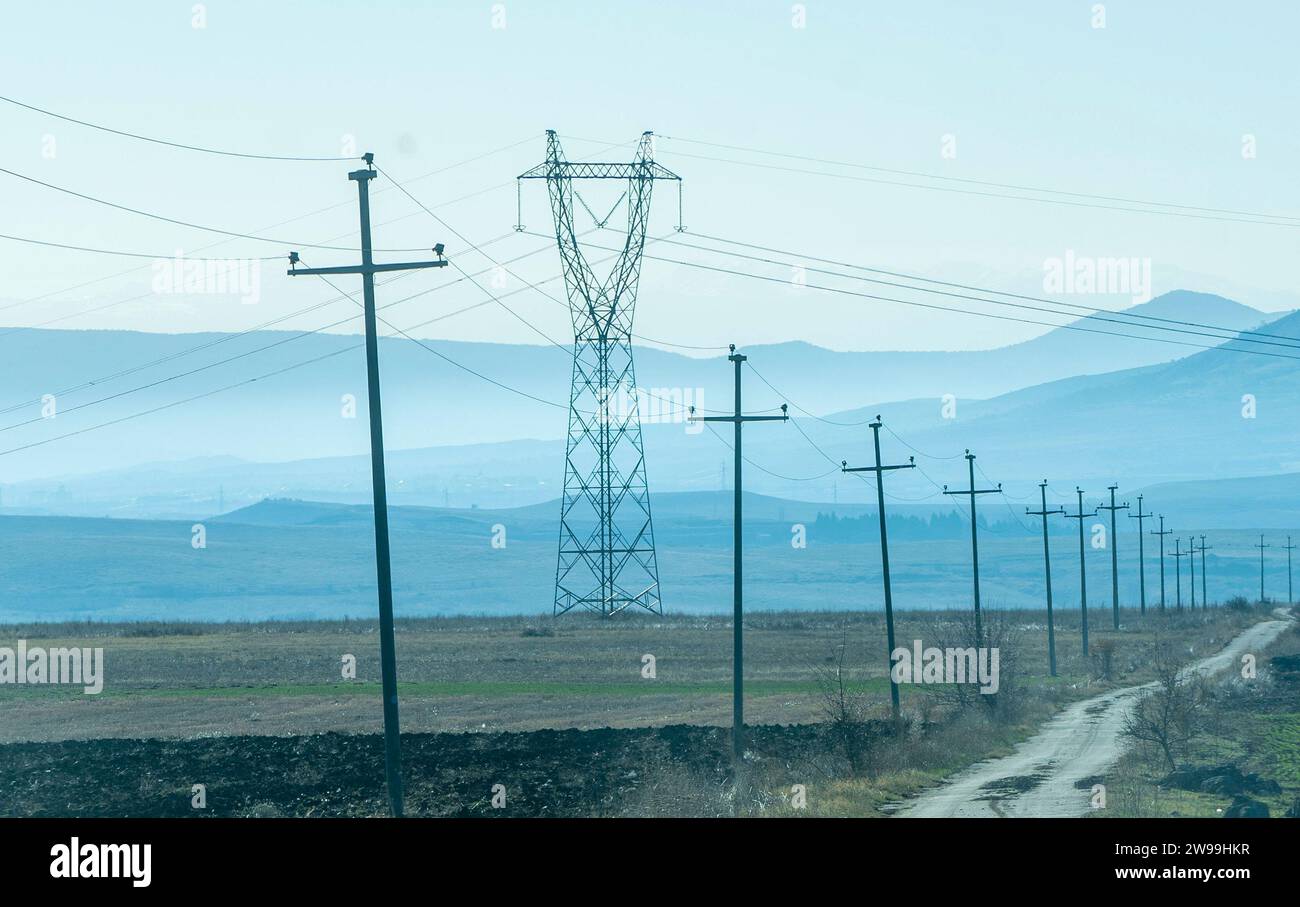 Empowering the rural grid. transmission power line infrastructure for remote communities. Stock Photo