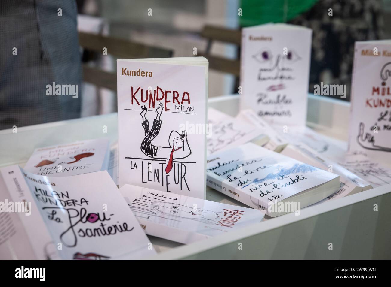 Picture of the book covers of La Lenteur By Milan Kundera in a bookstore of Belgrade, Serbia. Slowness is a novel by Czech writer Milan Kundera publis Stock Photo