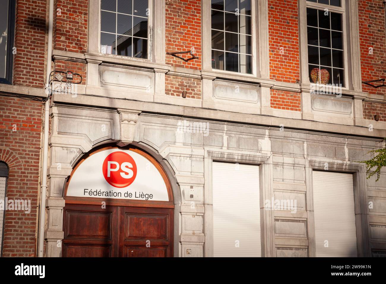 Picture of a sign with the Parti Socialiste logo on their main office for Liege. The Socialist Party (Parti socialiste, PS) is a social democratic Fre Stock Photo