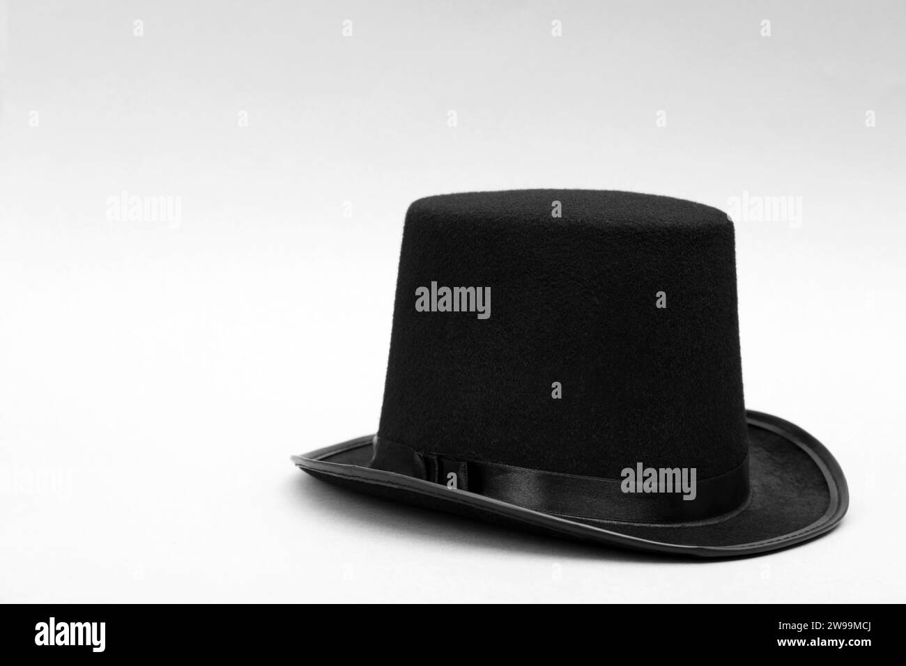 One magician top hat on white background, space for text Stock Photo ...