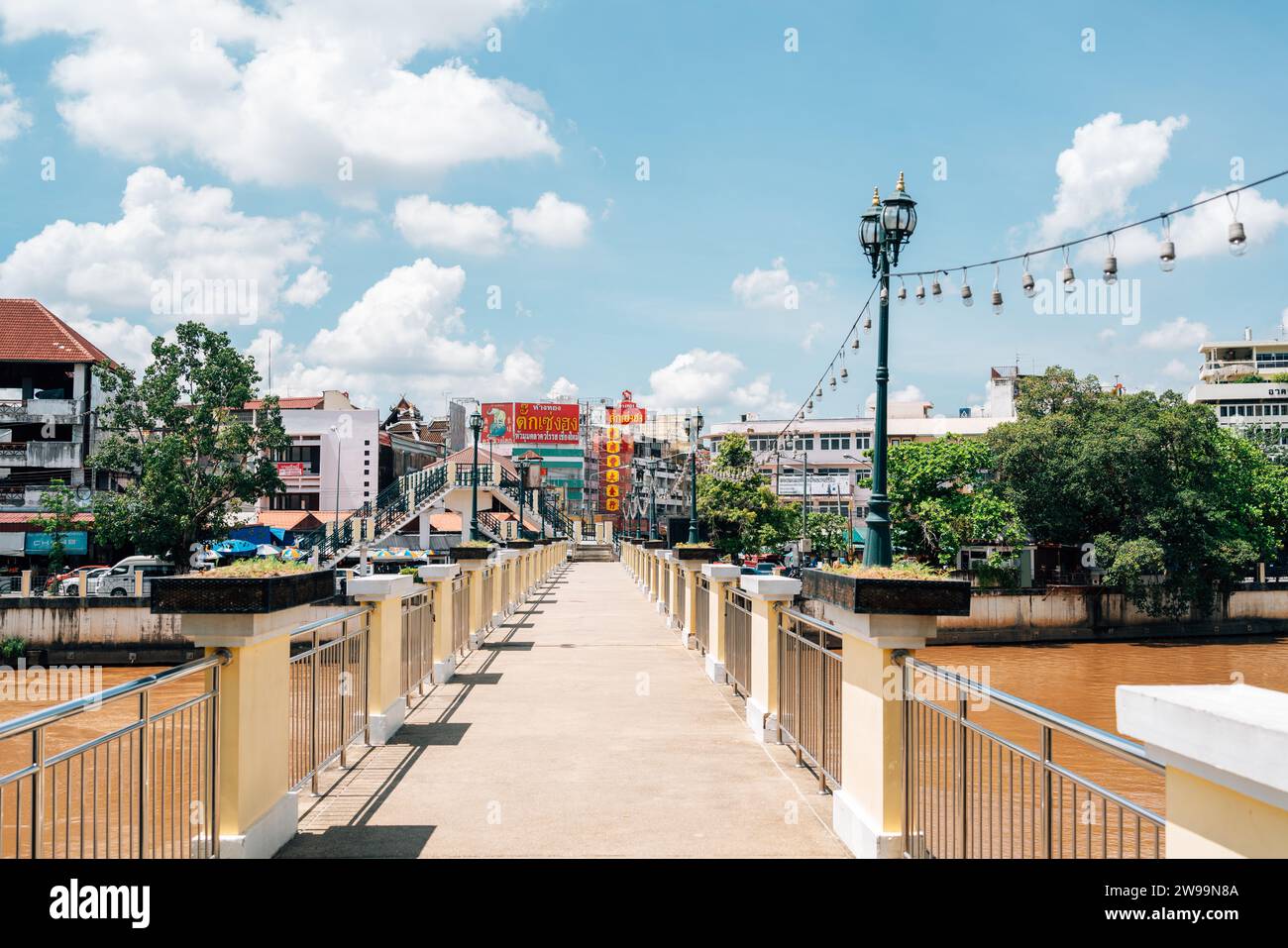 Chiang Mai, Thailand - September 23, 2023 : Ping river bridge and market street Stock Photo
