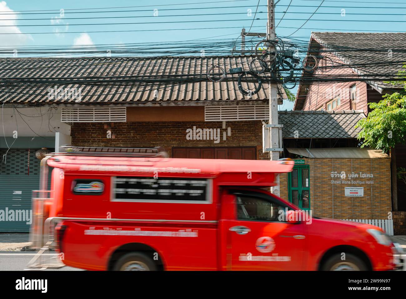 Chiang Mai, Thailand - September 23, 2023 : Songtaew red minibus public ...
