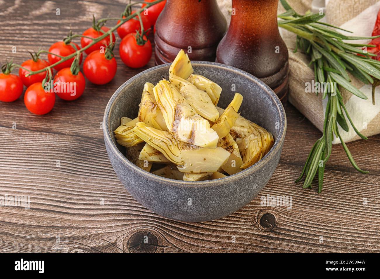 Grilled artichoke marinated in olive oil Stock Photo Alamy