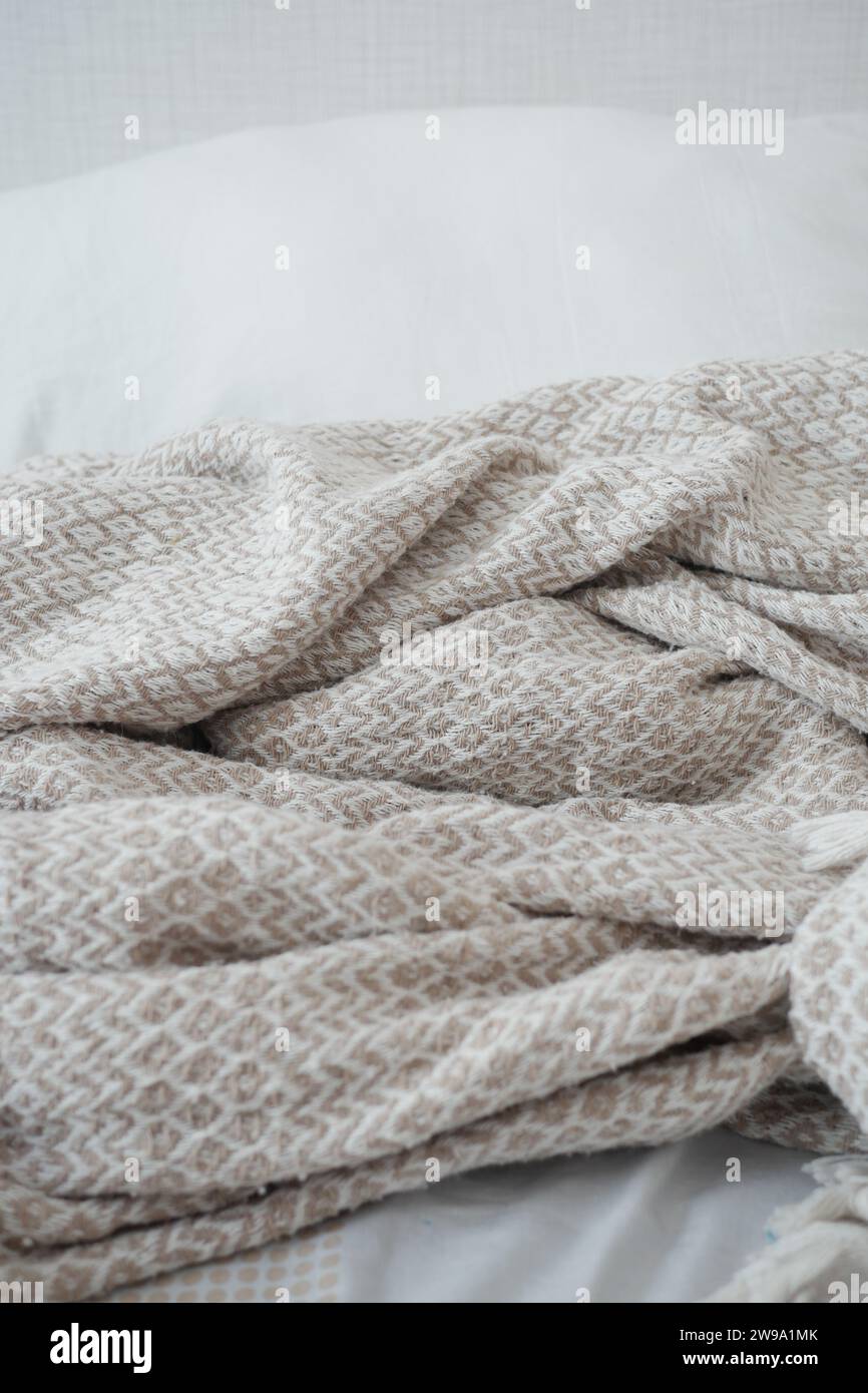 Bed with messy pick color Blankets, Stock Photo