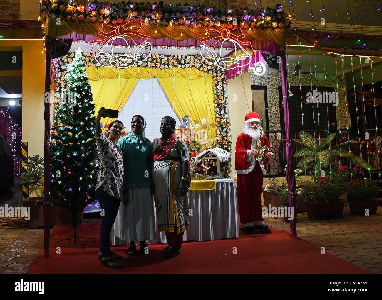 Christmas tree ornaments decorative material celebrating Christmas Festival  kept for sell in shop at Borivali Mumbai Stock Photo - Alamy