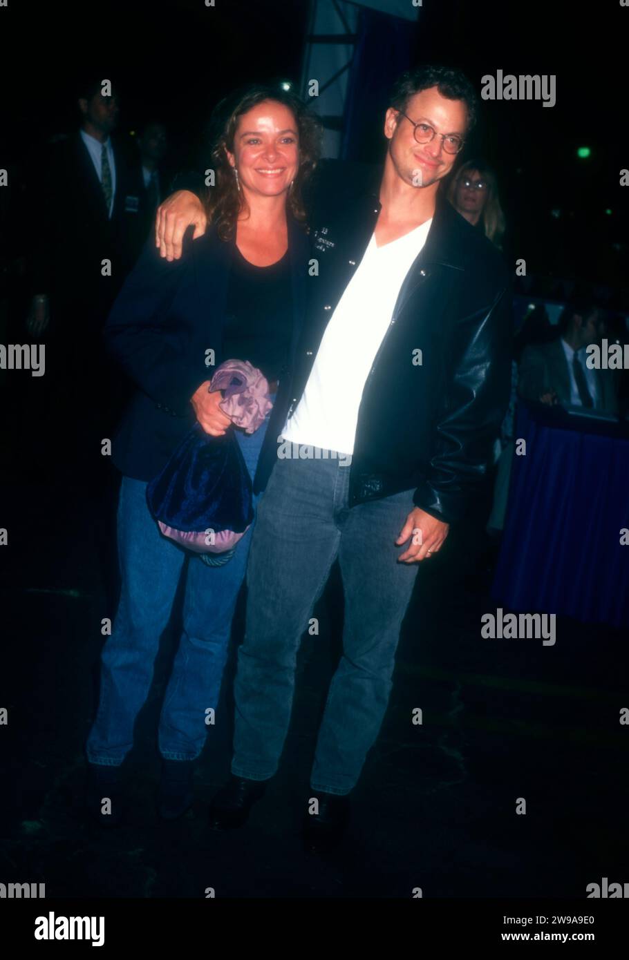 Century City, California, USA 30th September 1996 Actor Gary Sinise and wife Moira Harris attend 20th Century StudioÕs ÔThat Thing You DoÕ Premiere at Century City Cineplex Odeon Theaters on September 30, 1996 in Century City, California, USA. Photo by Barry King/Alamy Stock Photo Stock Photo