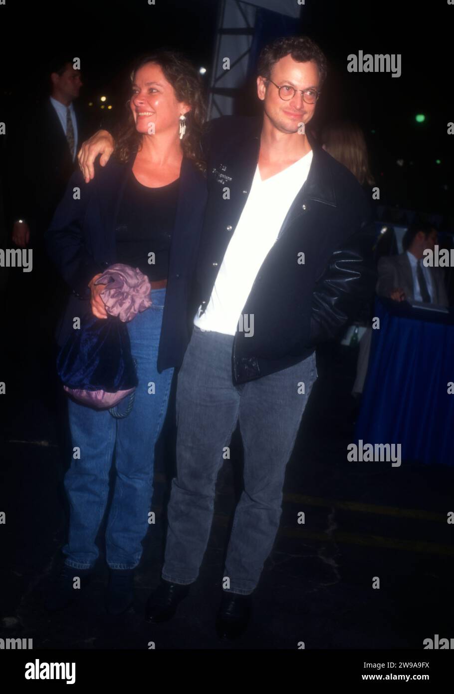 Century City, California, USA 30th September 1996 Actor Gary Sinise and wife Moira Harris attend 20th Century StudioÕs ÔThat Thing You DoÕ Premiere at Century City Cineplex Odeon Theaters on September 30, 1996 in Century City, California, USA. Photo by Barry King/Alamy Stock Photo Stock Photo