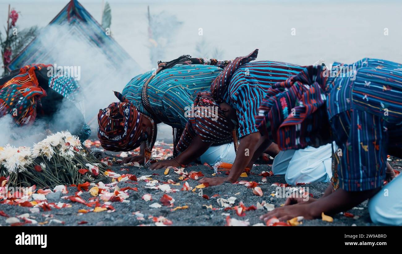 Aboriginal smoking ceremony, mans hand is holding the smoke of burning plants, the ritual rite
