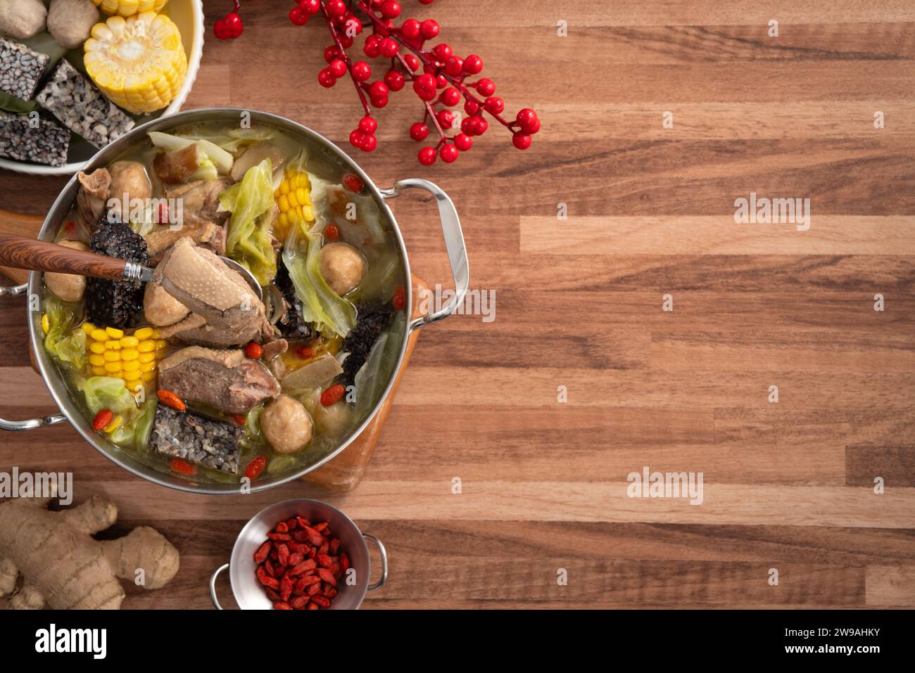 Delicious ginger duck stew hot pot soup with fresh vegetables in Taiwan. Stock Photo
