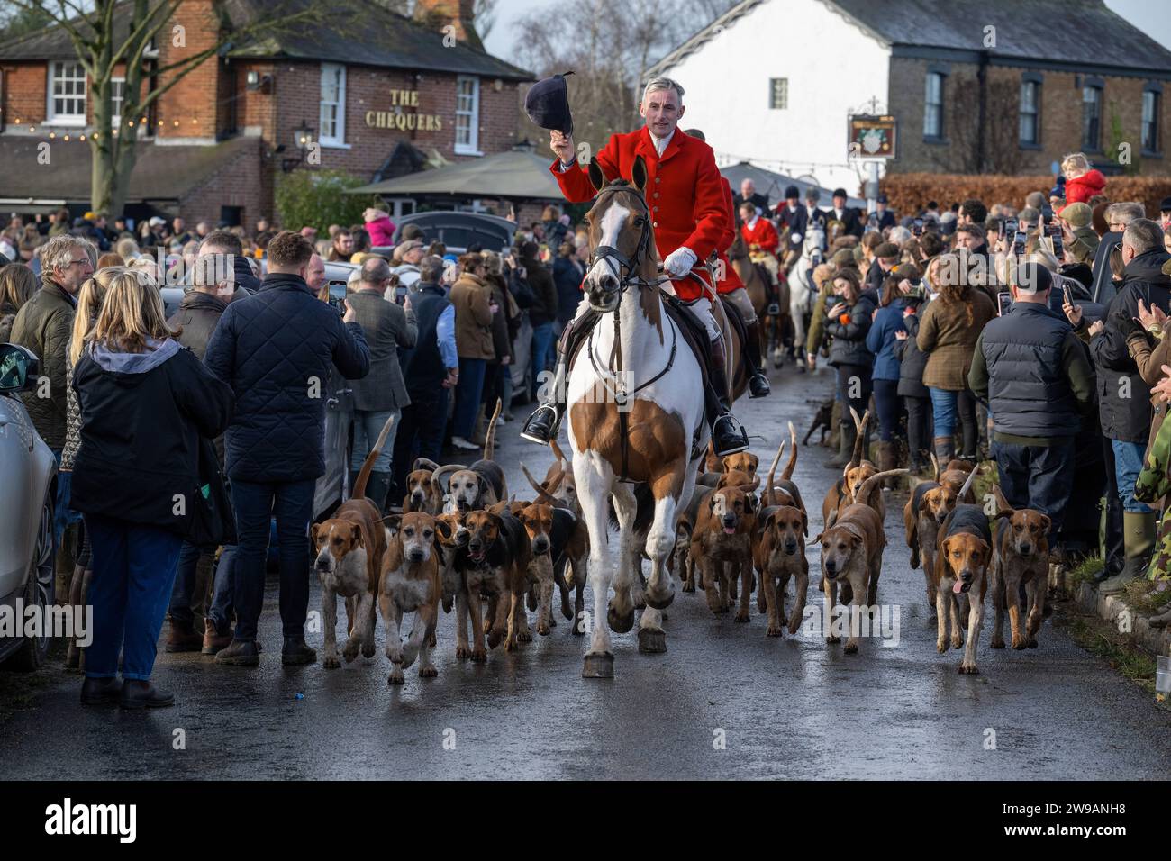 Essex with Farmers and Union Hunt Hundreds of people attend as the Essex with Farmers and Union Hunt sets off for it s annual Boxing Day ride from the Chequers Pub in the rural Essex village of Matching Green UK. The Essex Hunt has met regularly in Matching Green since the early 19th century, although since the 2004 Hunting Act it has not been allowed to use dogs to chase and kill foxes. Matching Green Essex UK Copyright: xMartinxDaltonx Essex Hunt 261223 MD 183 Stock Photo