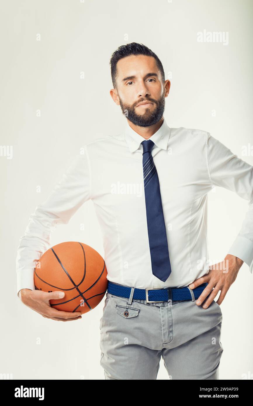 Photo inspiration: Visual Reference: Corporate Strategist In Business Attire Promotes Sports As A Model