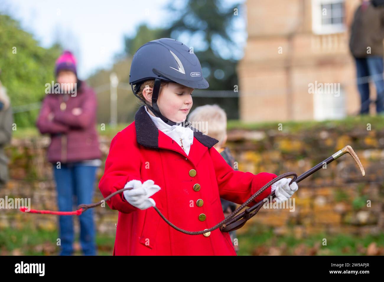 Hagley, Worcestershire, UK. 26th Dec, 2023. 4 year old Myla Mills is all dressed up for the Albrighton and Woodland Hunt's Boxing Day meet at Hagley Hall, Worcestershire. Credit: Peter Lopeman/Alamy Live News Stock Photo