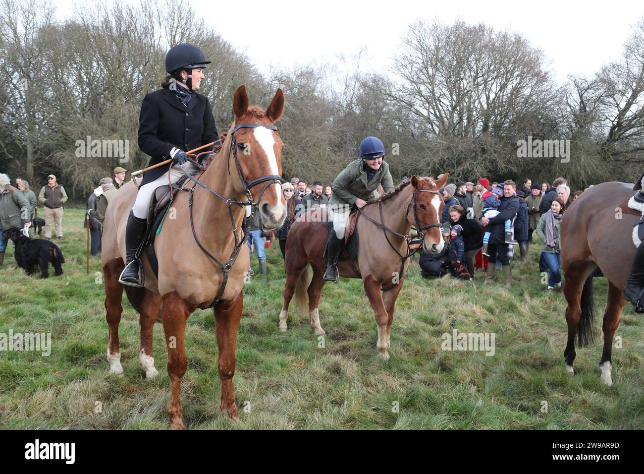 Hawridge, Chesham, UK. 26th Dec, 2023. Riders and their hounds gather in a field before the annual hunt. Credit: Uwe Deffner/Alamy Live News Stock Photo