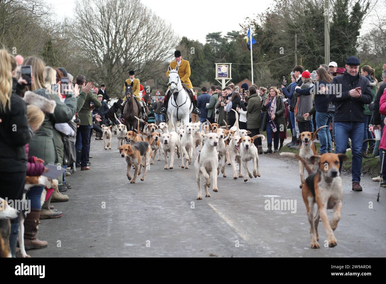 Hawridge, Chesham, UK. 26th Dec, 2023. Riders and their hounds gather in a field before the annual hunt. And off they go. Credit: Uwe Deffner/Alamy Live News Stock Photo