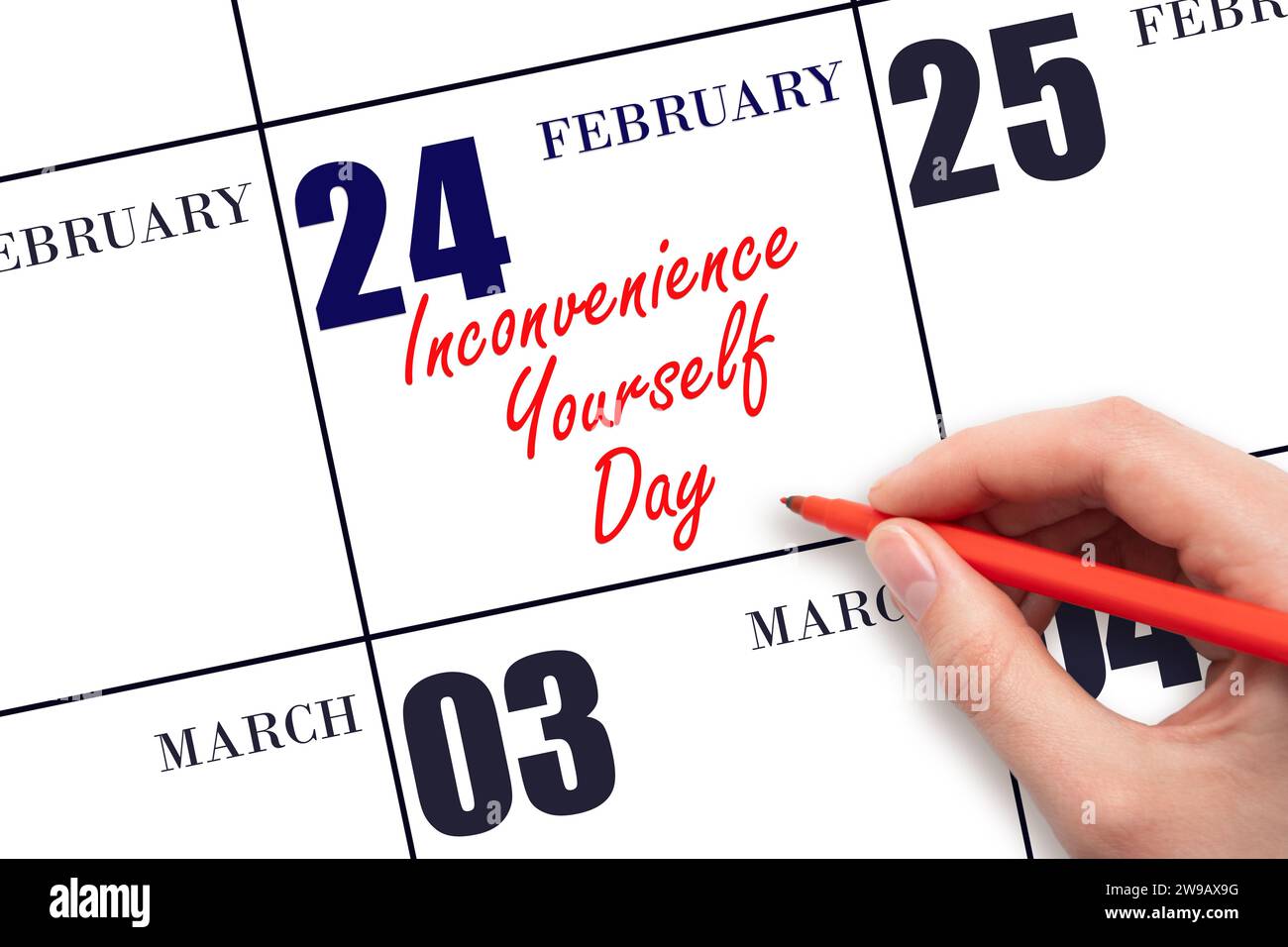 February 24. Hand writing text Inconvenience Yourself Day on calendar date. Save the date. Holiday. Day of the year concept. Stock Photo