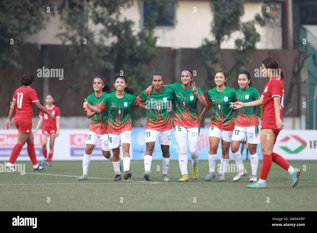 Bangladeshi footballers celebrate one of eight goals against Singapore in their FIFA friendly window with a thumping 8-0 win at the Birshreshtha Shahe Stock Photo