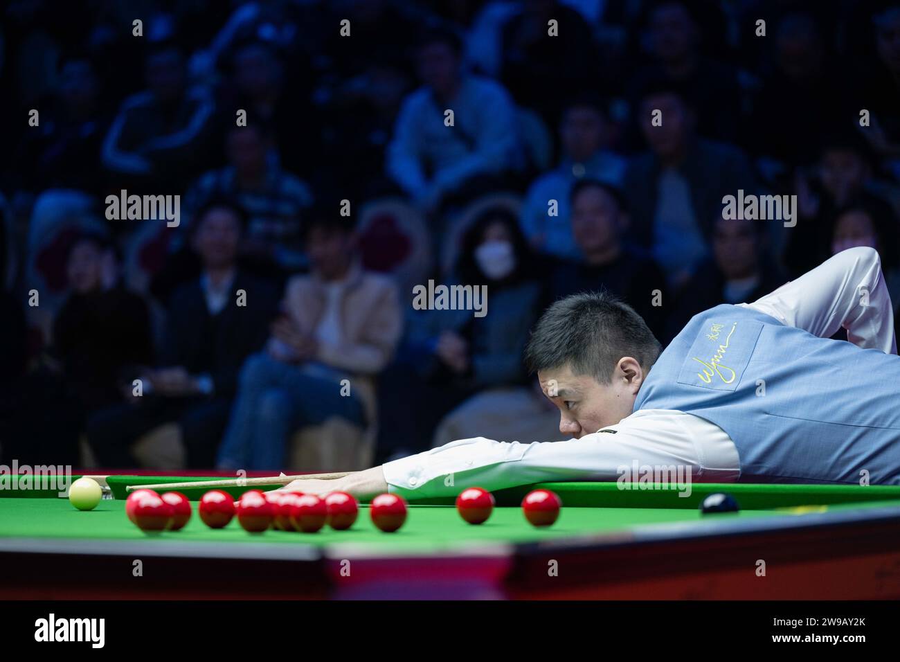 Macau, China. 26th Dec, 2023. Ding Junhui of China competes during the