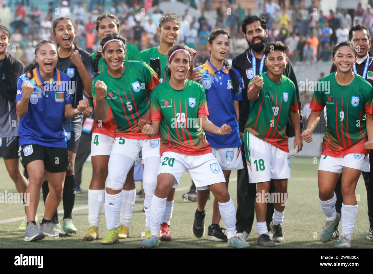 Bangladeshi footballers celebrate after win against Singapore in their