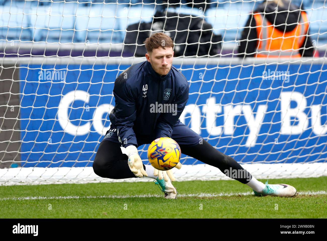 Coventry City goalkeeper Bradley Collins warming up prior to kickoff