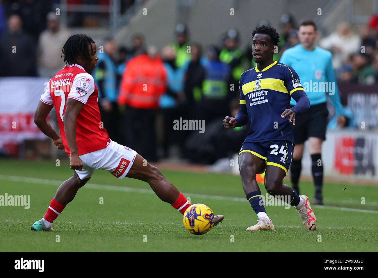Alex Bangura #24 of Middlesbrough plays the ball past Dexter Lembikisa #2 of Rotherham United during the Sky Bet Championship match Rotherham United vs Middlesbrough at New York Stadium, Rotherham, United Kingdom, 26th December 2023  (Photo by Ryan Crockett/News Images) Stock Photo