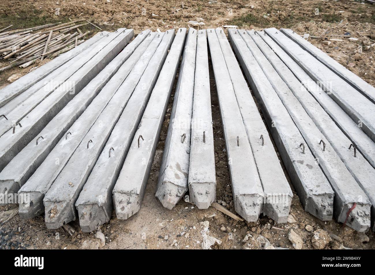 concrete piles on ground for house construction foundation Stock Photo