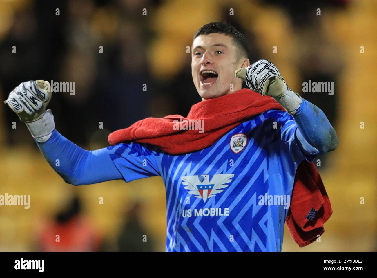 Burslem, UK. 26th Dec, 2023. Liam Roberts #1 of Barnsley punches the air after Barnsley win 2-3 during the Sky Bet League 1 match Port Vale vs Barnsley at Vale Park, Burslem, United Kingdom, 26th December 2023 (Photo by Alfie Cosgrove/News Images) in Burslem, United Kingdom on 12/26/2023. (Photo by Alfie Cosgrove/News Images/Sipa USA) Credit: Sipa USA/Alamy Live News Stock Photo