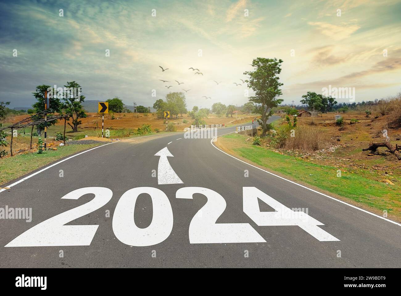 New year 2024 concept. Text 2024 written on the road in the middle of