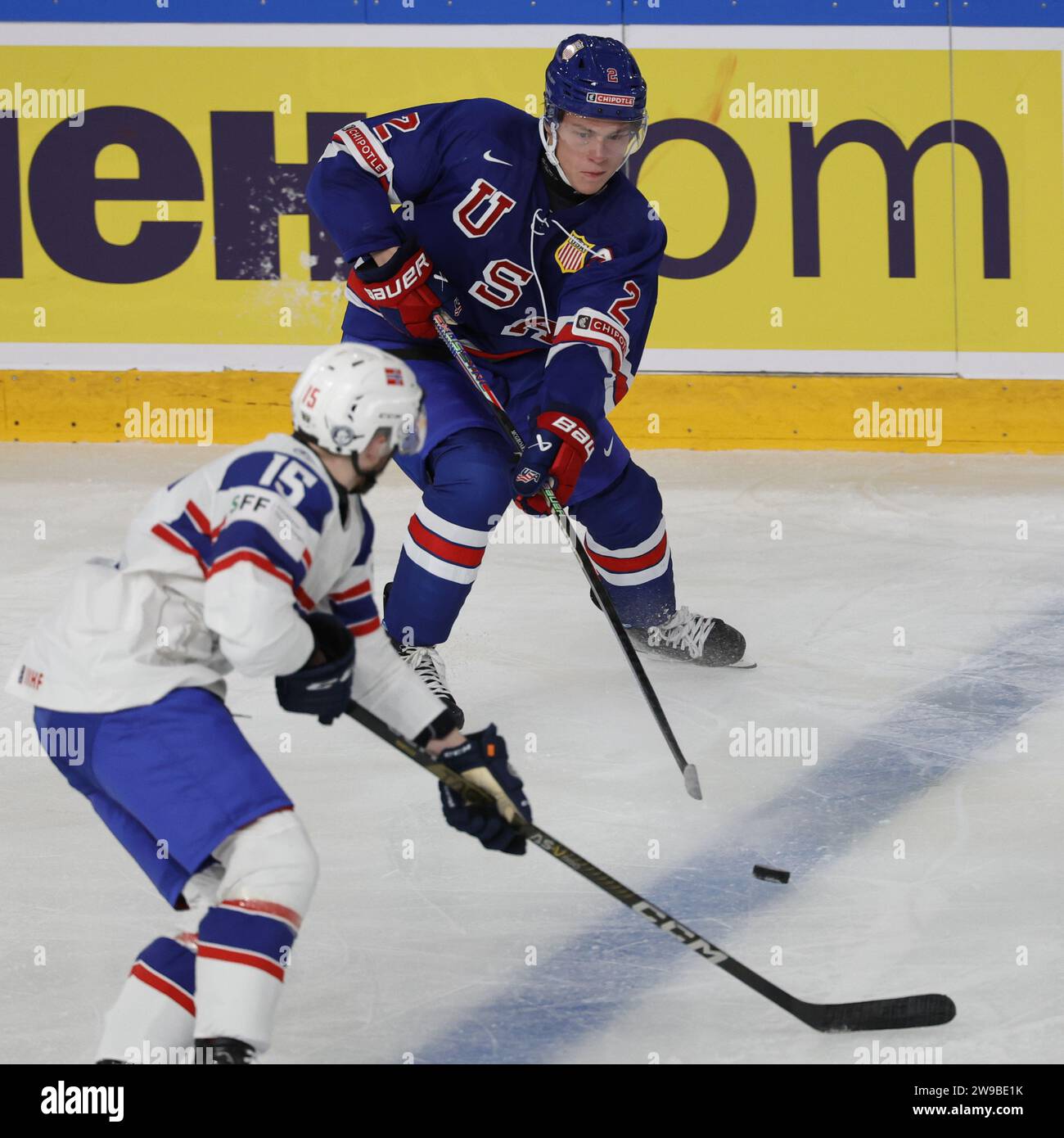 Usa's Rutger McGroarty and Norway's Patrik Dalen during the IIHF World Junior Championship group B ice hockey match between USA and Norway at Frolundaborg in Gothenburg, Sweden December 26, 2023. Stock Photo