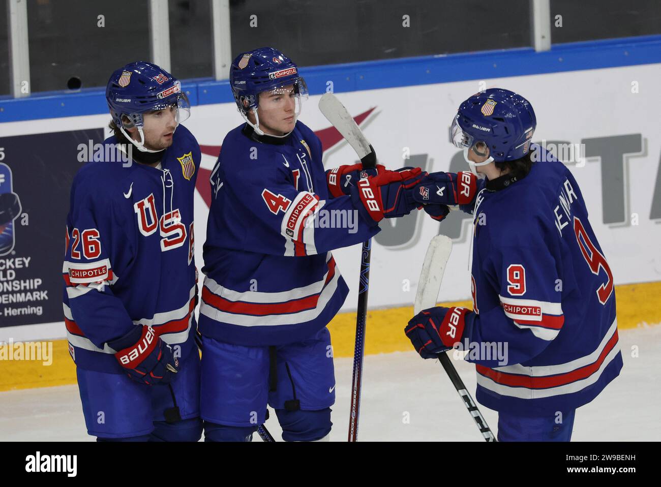 USA's Gavin Brindley celebrates 2-0 with Seamus Casey and Ryan Leonard during the IIHF World Junior Championship group B ice hockey match between USA Stock Photo