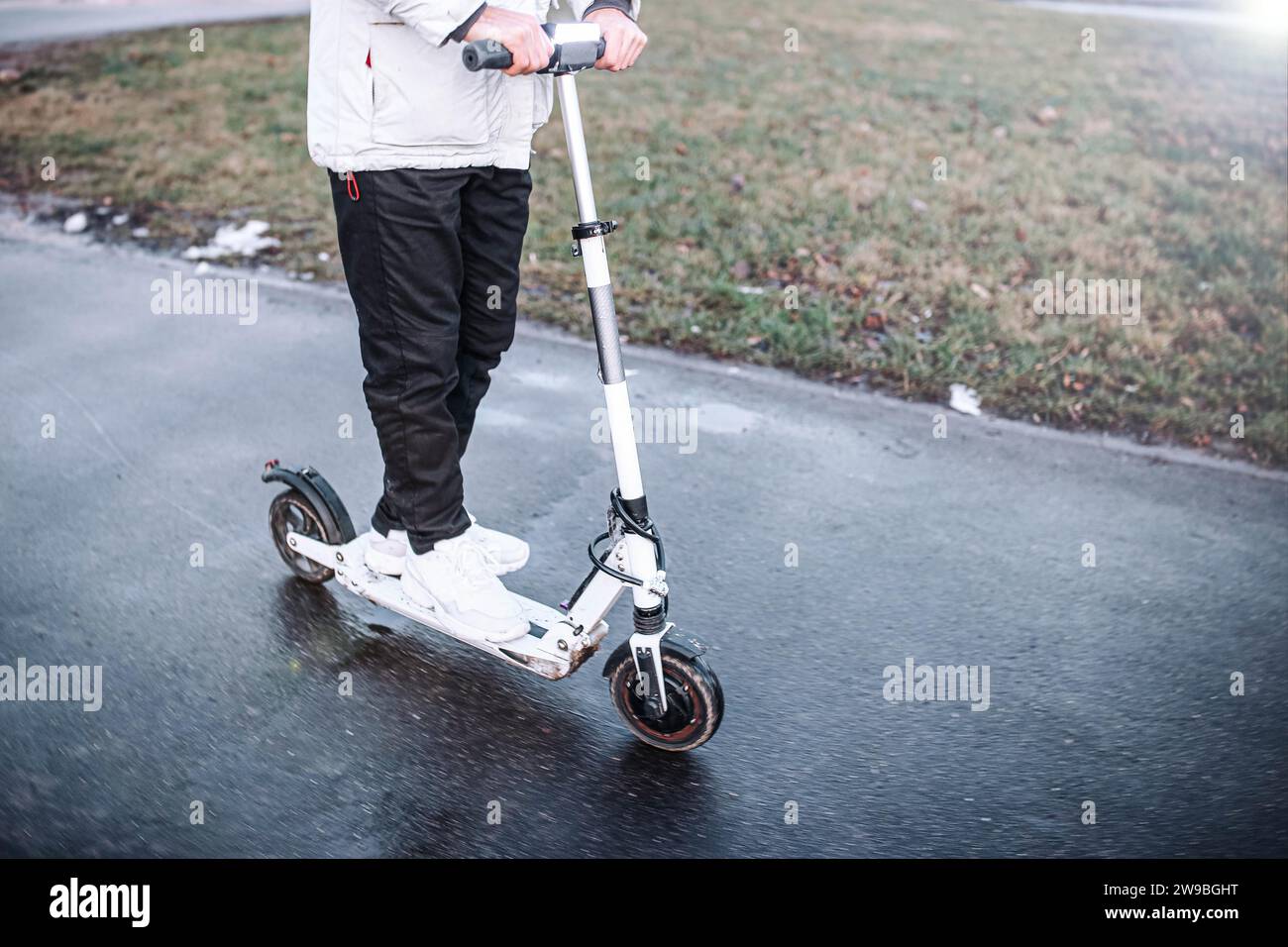 Male rides electric scooter hi-res stock photography and images - Alamy