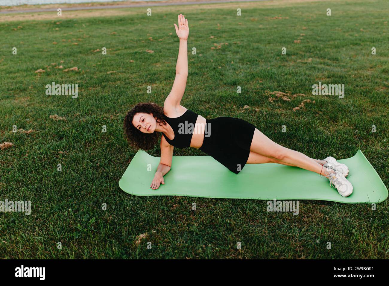 Young Woman Yoga Outdoors on the Lawn Stock Photo - Image of people, grass:  259535222