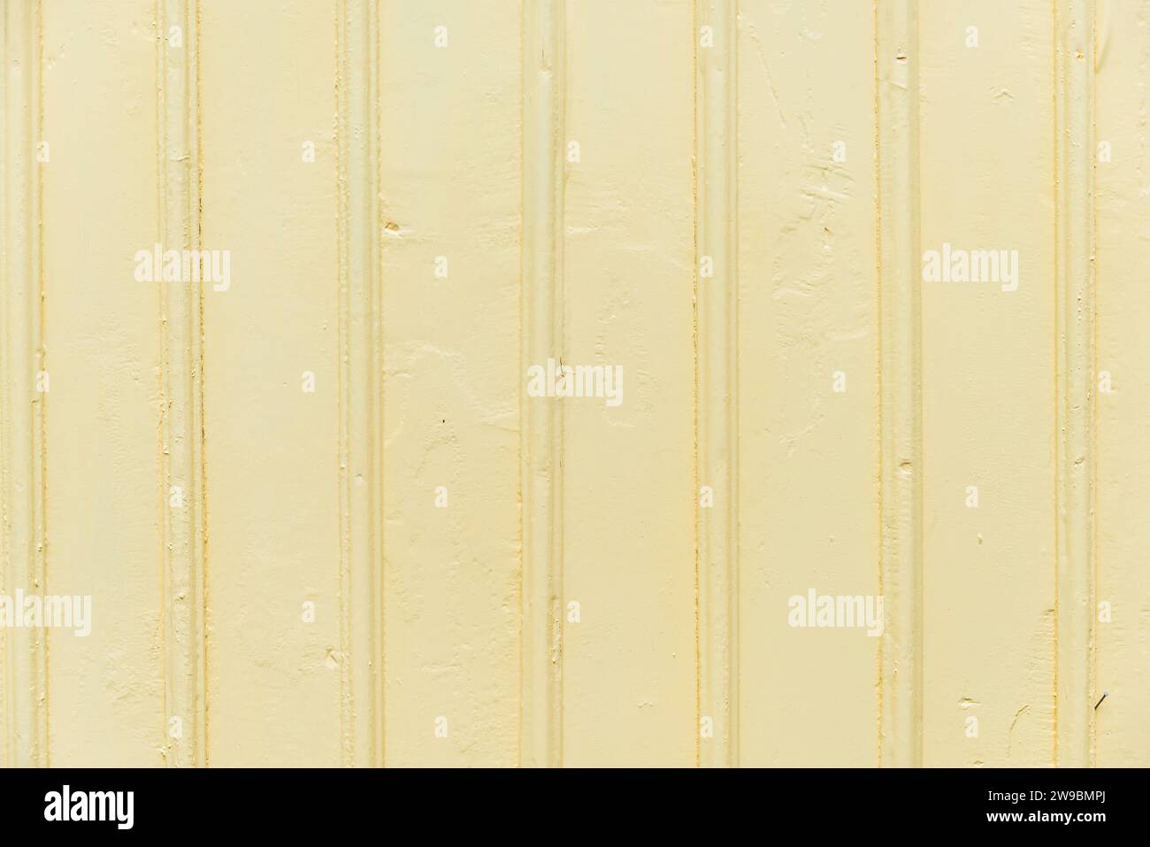 Light yellow painted boards of a wooden facade of a typical Swedish wooden house, Fiskebäckskil, Orust, Sweden Stock Photo