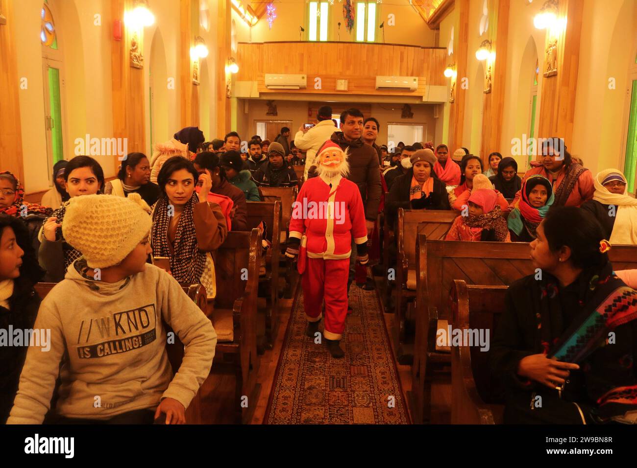 December 25,2023, Srinagar Kashmir, India A boy dressed as Santa