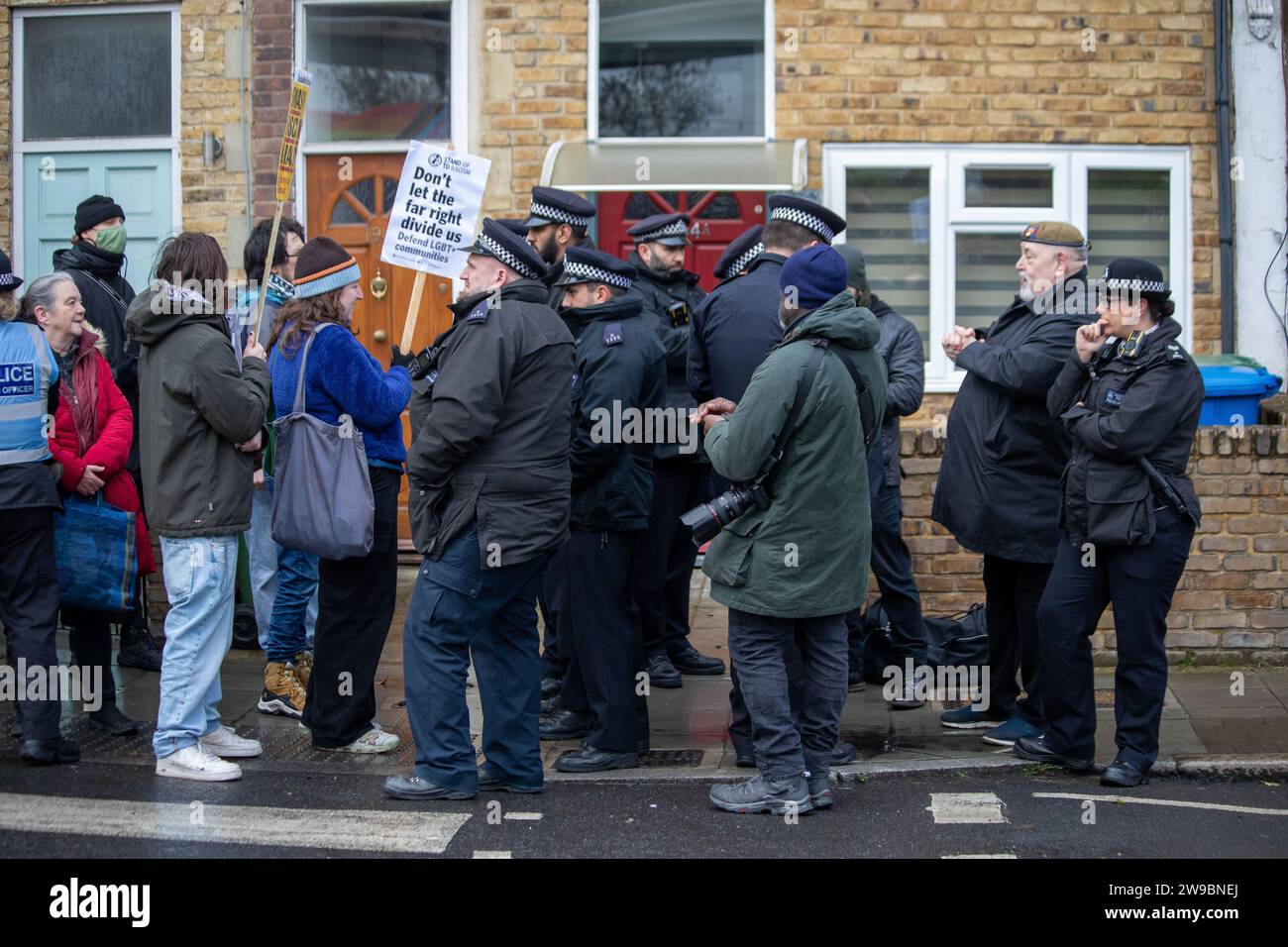 Far right and antifascist counter protesters face off at a demonstration about drag queen storytime in South London Stock Photo