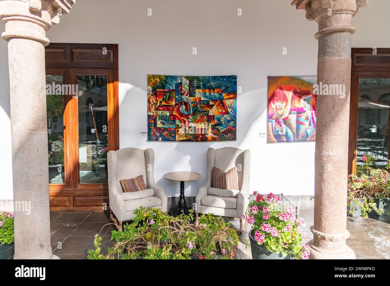 Artwork / Painting hanging on the wall in the courtyard of the Marriott El Convento Hotel in Cusco, Peru Stock Photo