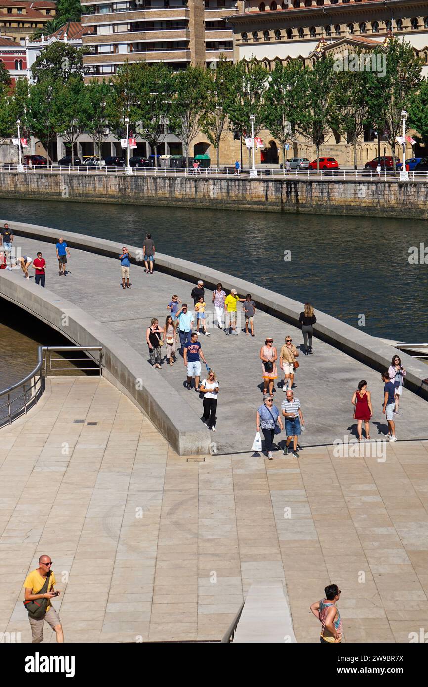 group-of-people-visiting-bilbao-city-spain-travel-destinations-stock