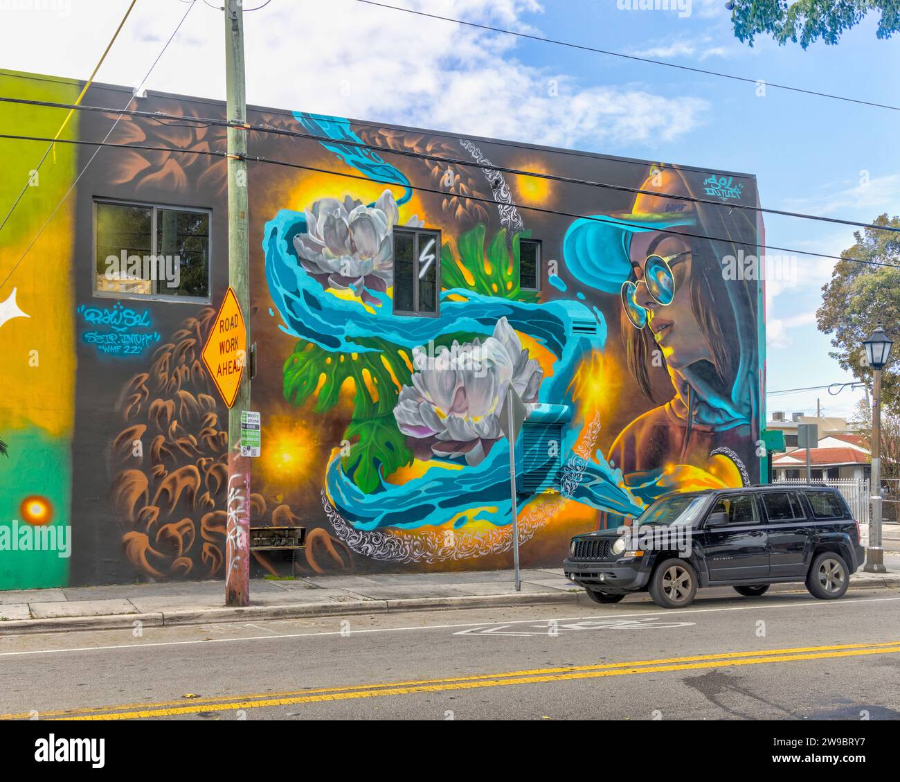 Graffiti or murals painted in building facades at Wynwood in Miami, FL
