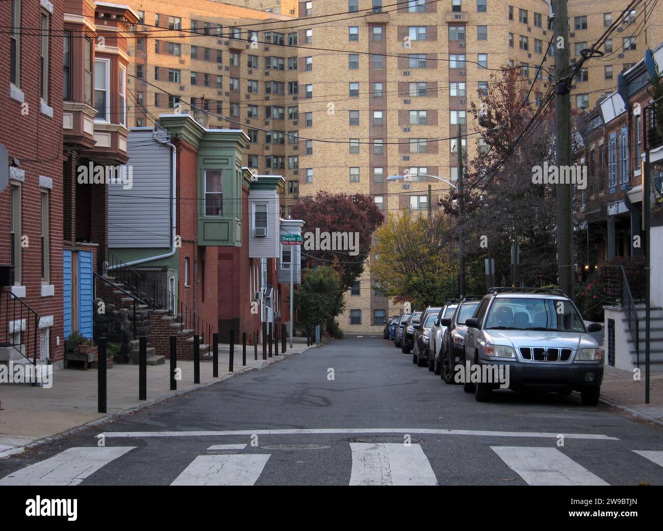 The bulk of 2601 Parkway, a condominium building, backdrops the 700 block of North Taney Street in the Fairmount neighborhood. Stock Photo