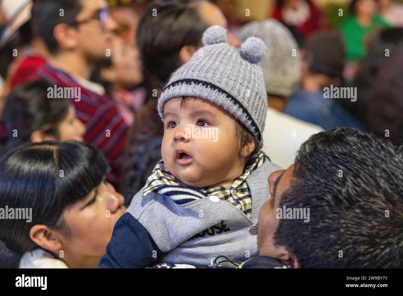 A child at a ceremony procession in Aguas Calientes, Peru, celebrating the anniversary of Machu Picchu being declared a wonder of the world Stock Photo
