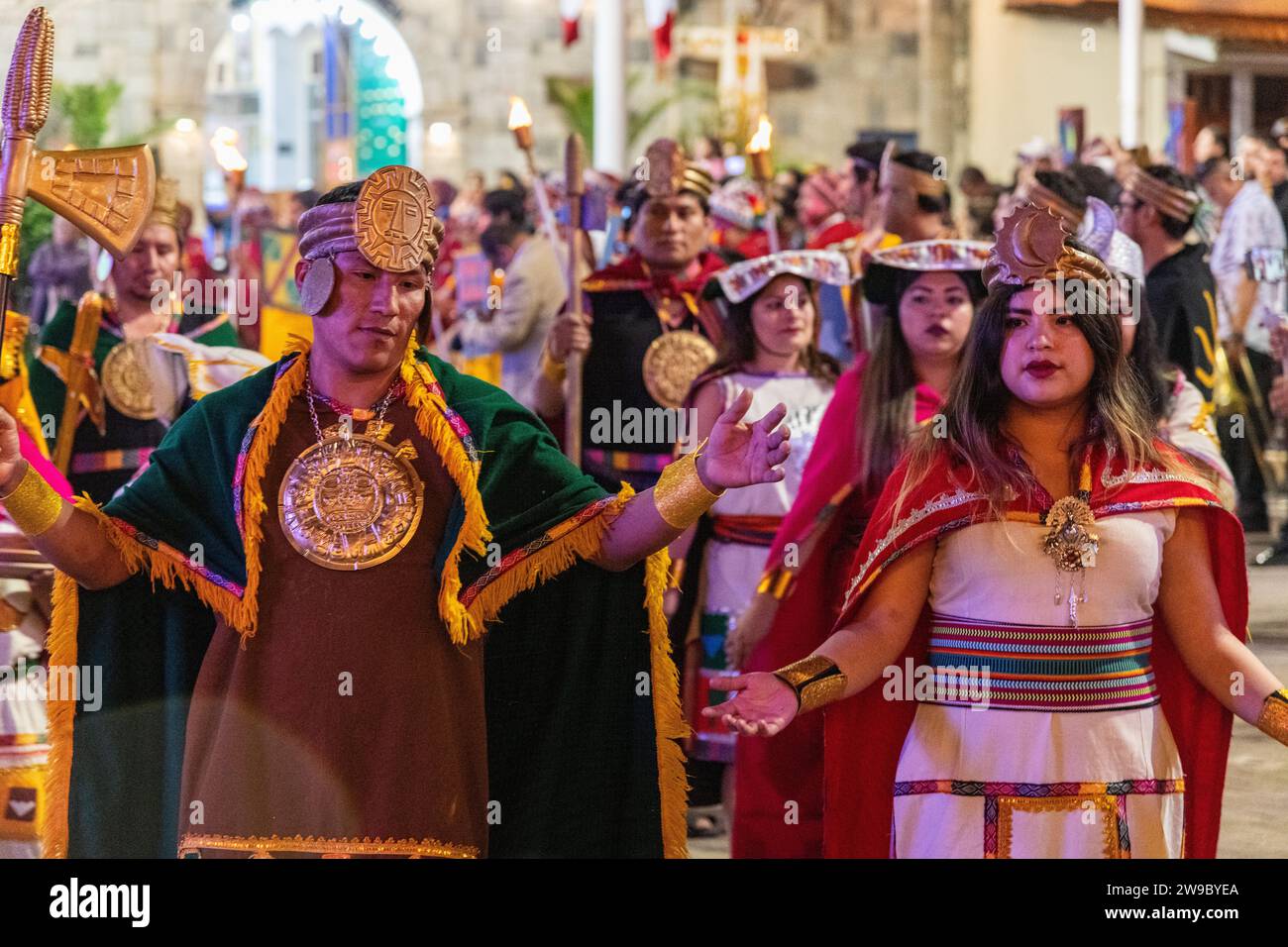 A ceremony procession in Aguas Calientes, Peru, celebrating the anniversary of Machu Picchu being declared a wonder of the world Stock Photo